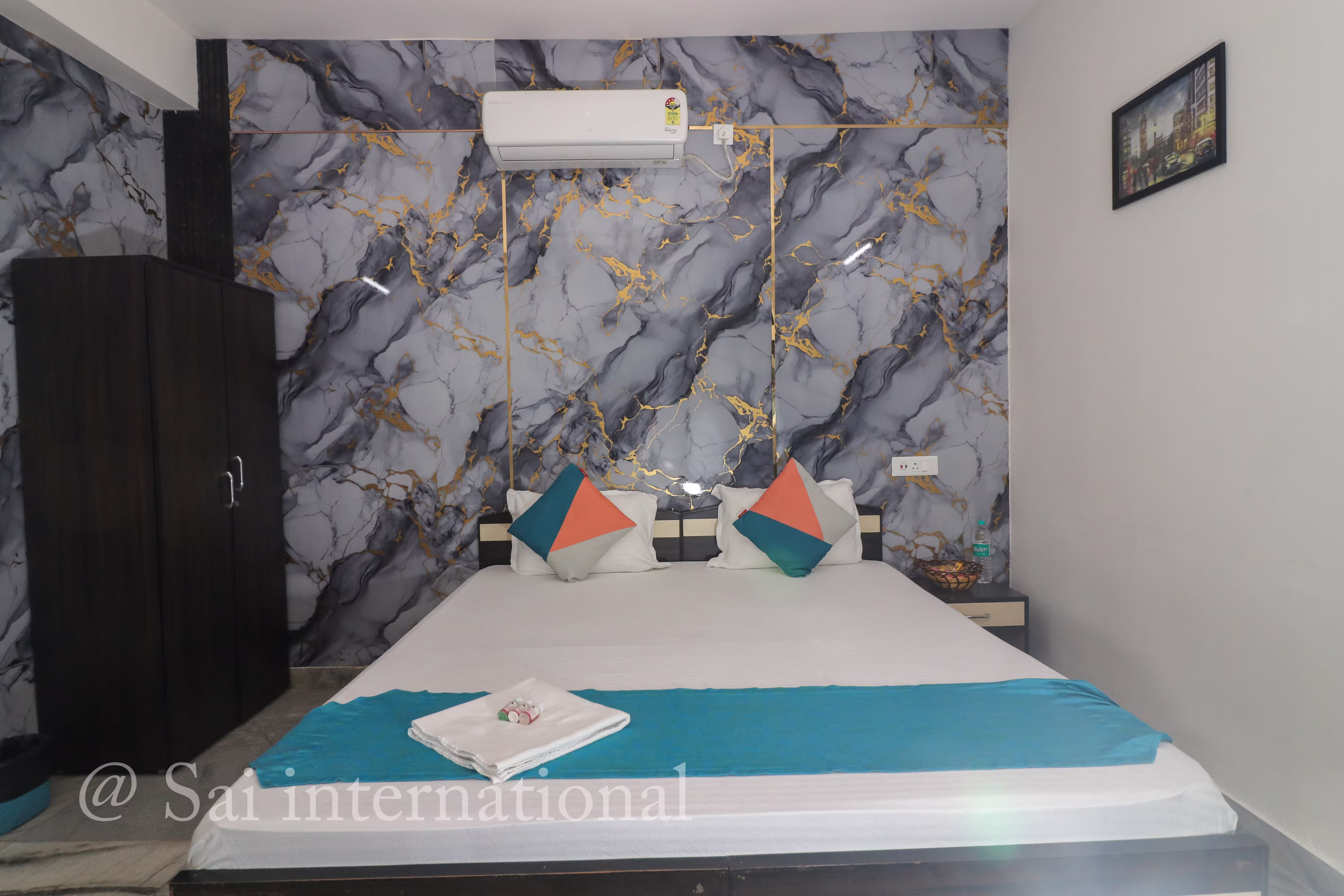Deluxe Room with king-size bed and cozy design